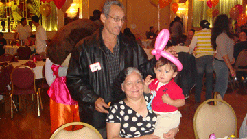 Grandparents with a child at their table