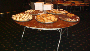 Table of pies and desserts ready to serve
