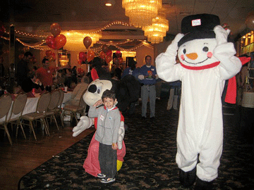 Child meeting the snowman character